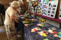 Examining-the-flower-arranging-and-photographic-exhibits-2